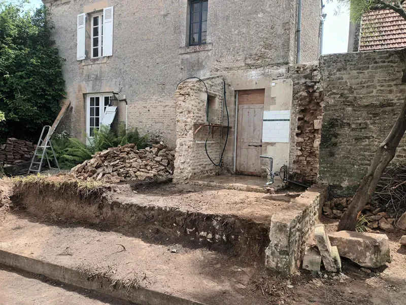 mur en pierre avant